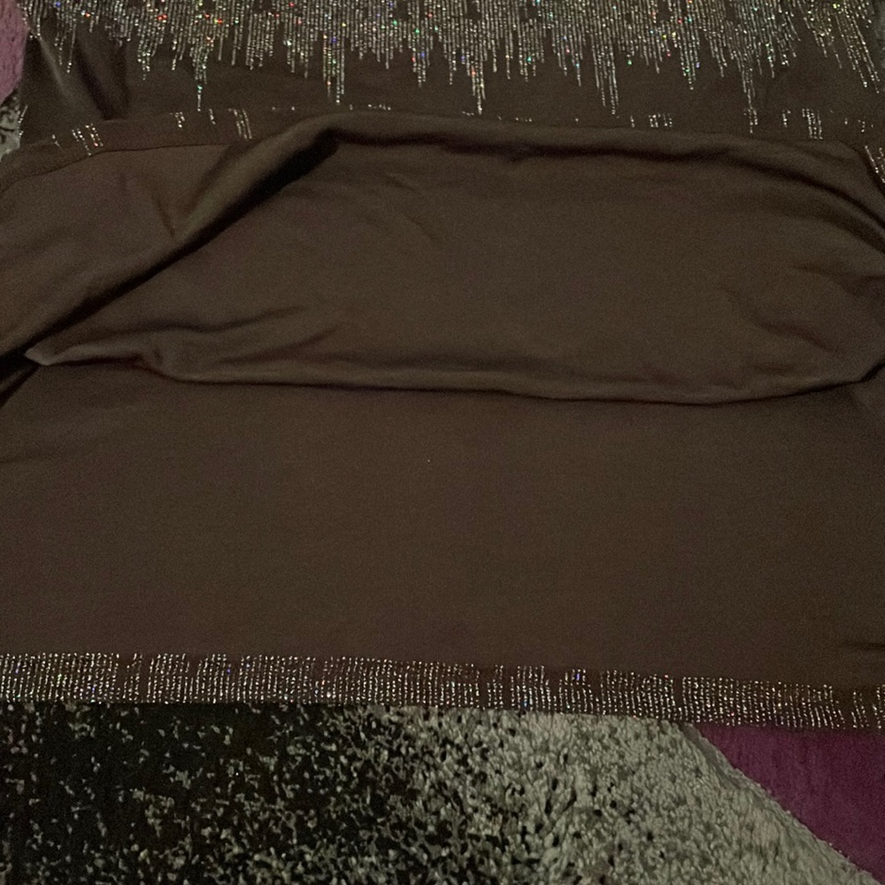 The colors are a dark brown with a shiny little design